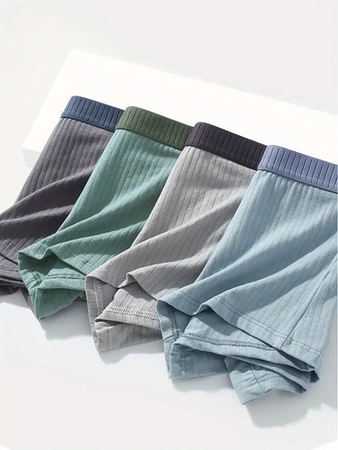 SÆT MED 7 ELASTISKE OG ÅNDBARE BOKSERSHORTS I BOMULD